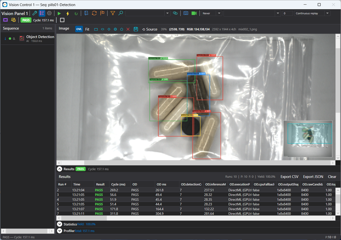 VisionBase Studio Object Detection — pills and capsules located in a bag with labelled bounding boxes, DirectML GPU inference, and 100% yield results